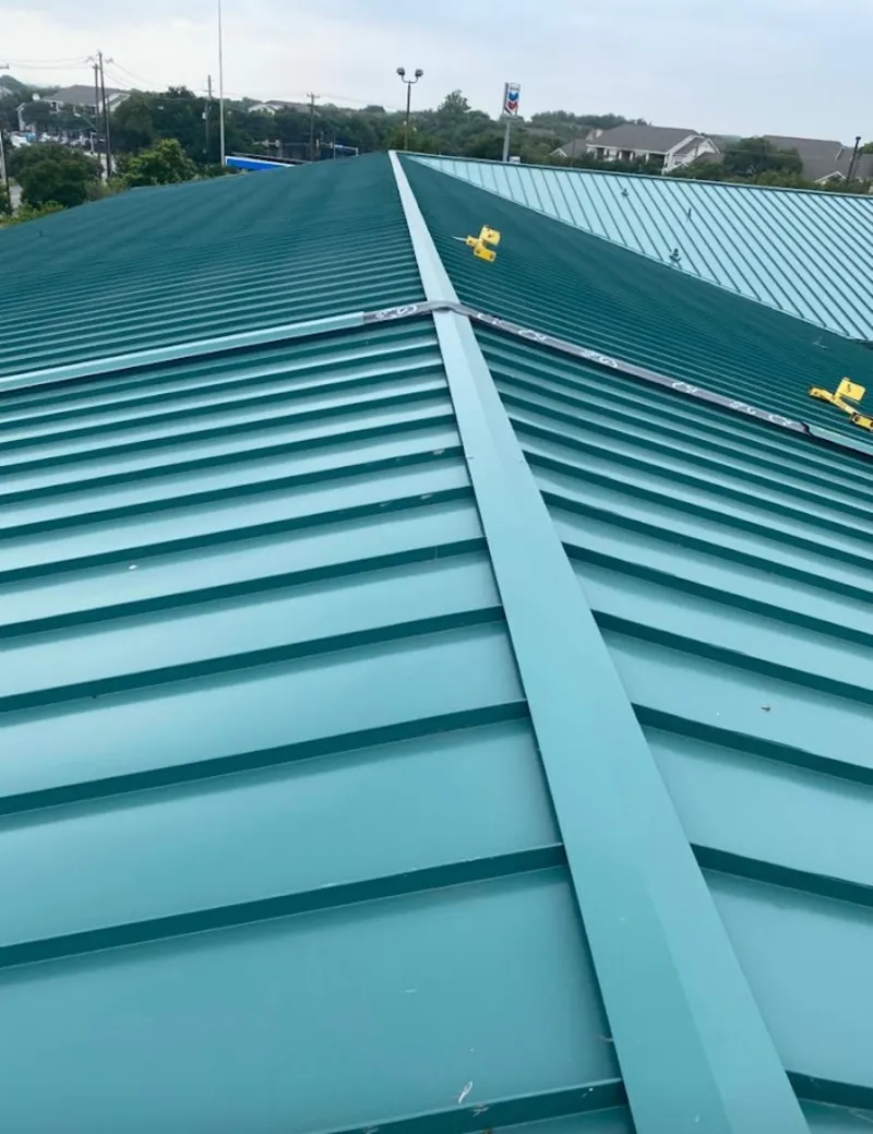 Green commercial metal roof ridge and valley for Metal Roof Repair in Coralville