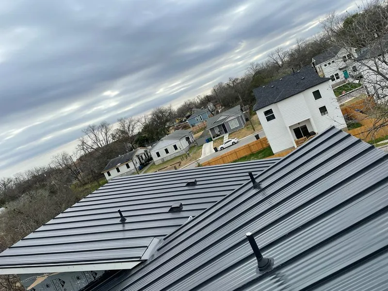 Standing seam metal roof panels with vents for Skylight Repair in Coralville